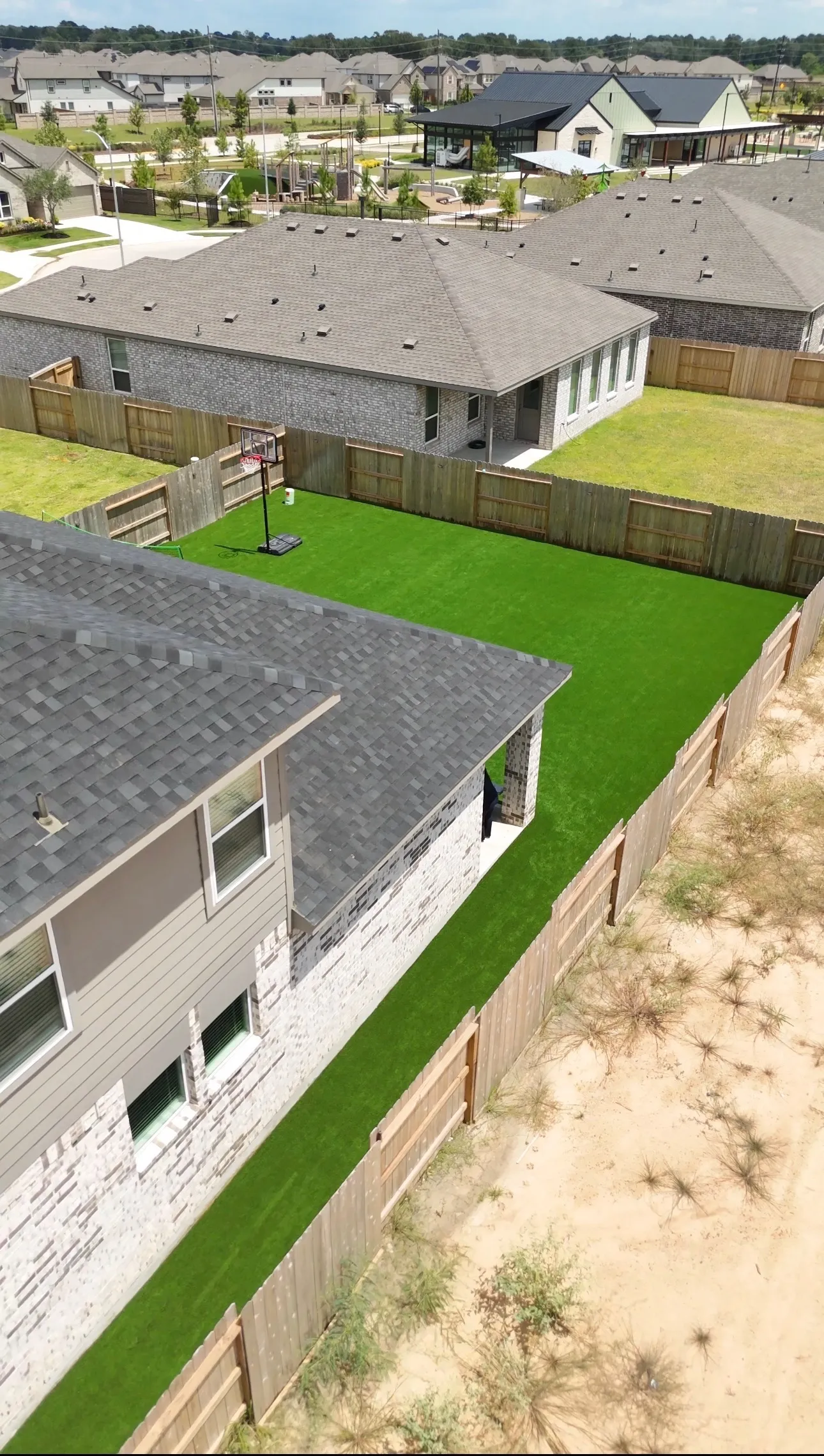 Residential backyard synthetic turf installation in Greater Houston