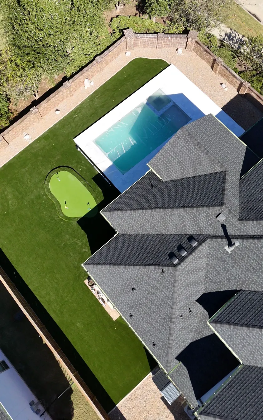Pet-friendly synthetic turf yard with antimicrobial infill